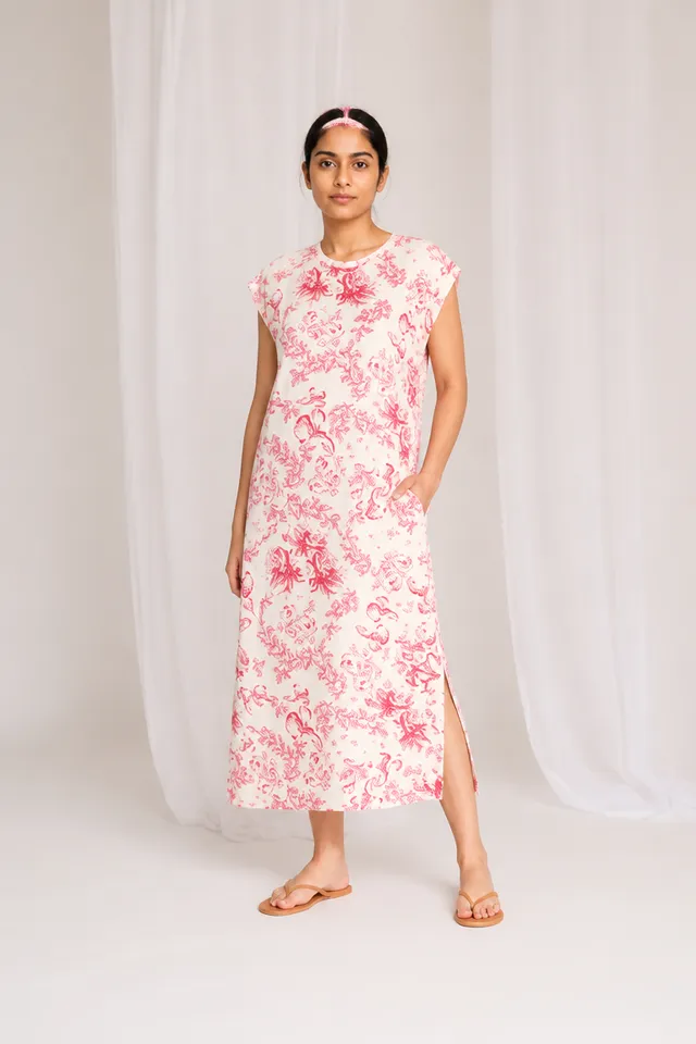 The floral midi dress rendered on a petite athletic South Asian woman, with size S recommended
